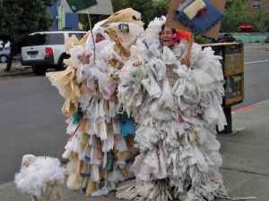 two women wearing plastic bags