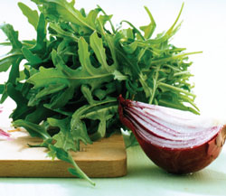 arugula onion cuttingboard