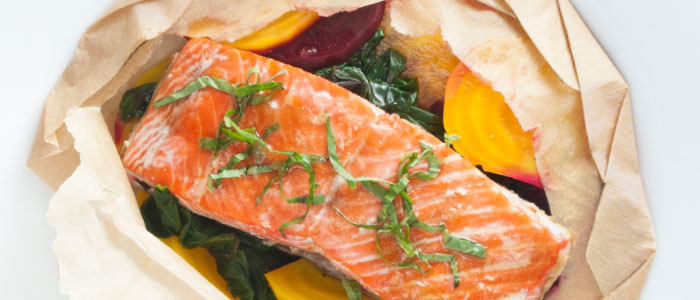 salmon cooking in parchment