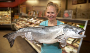 woman holding fish