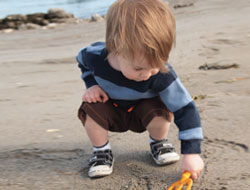 kid beach sand