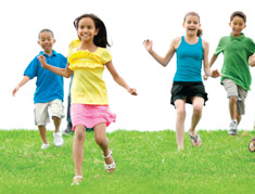 kids running grass
