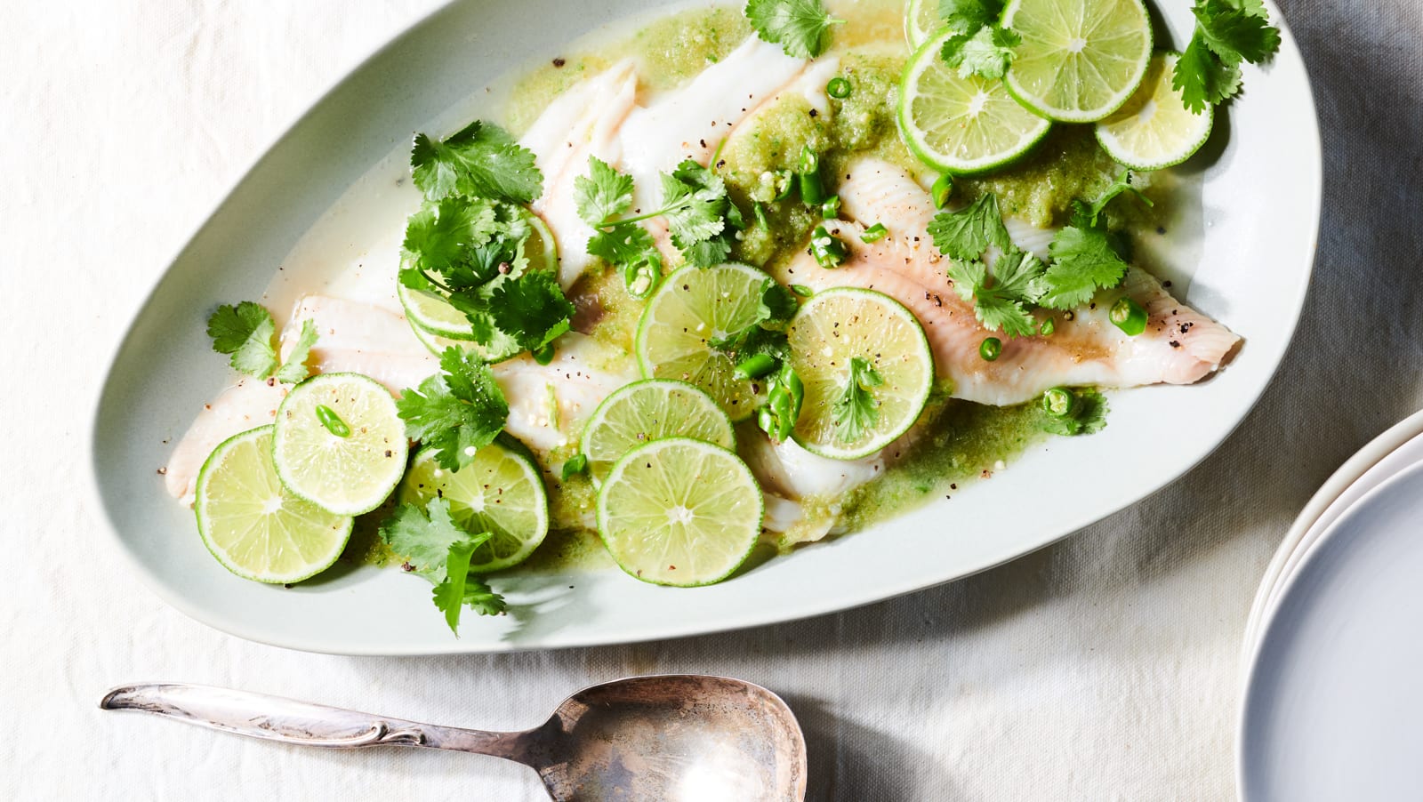 Pla Neung Ma Now (Steamed White Fish in Lime Sauce)