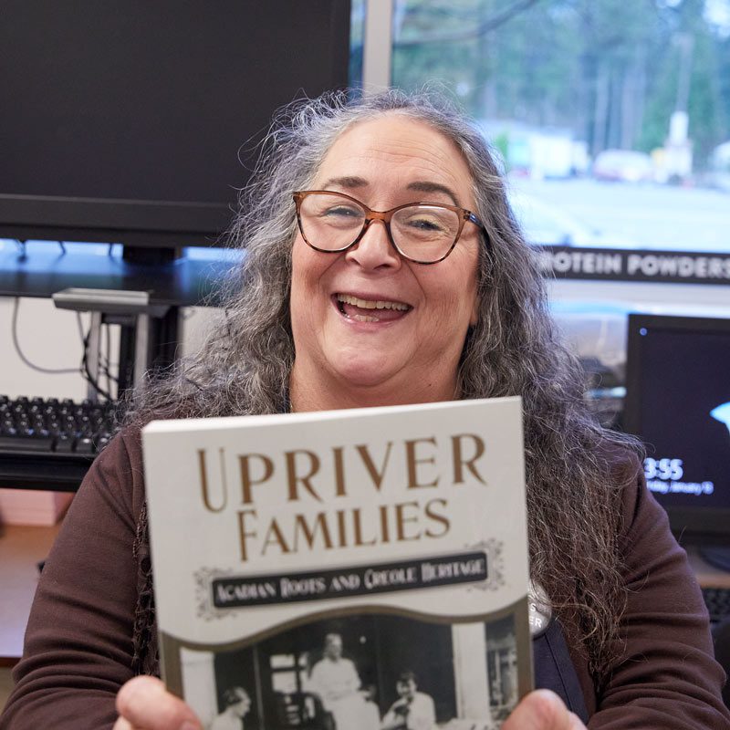 Kathi holding her book