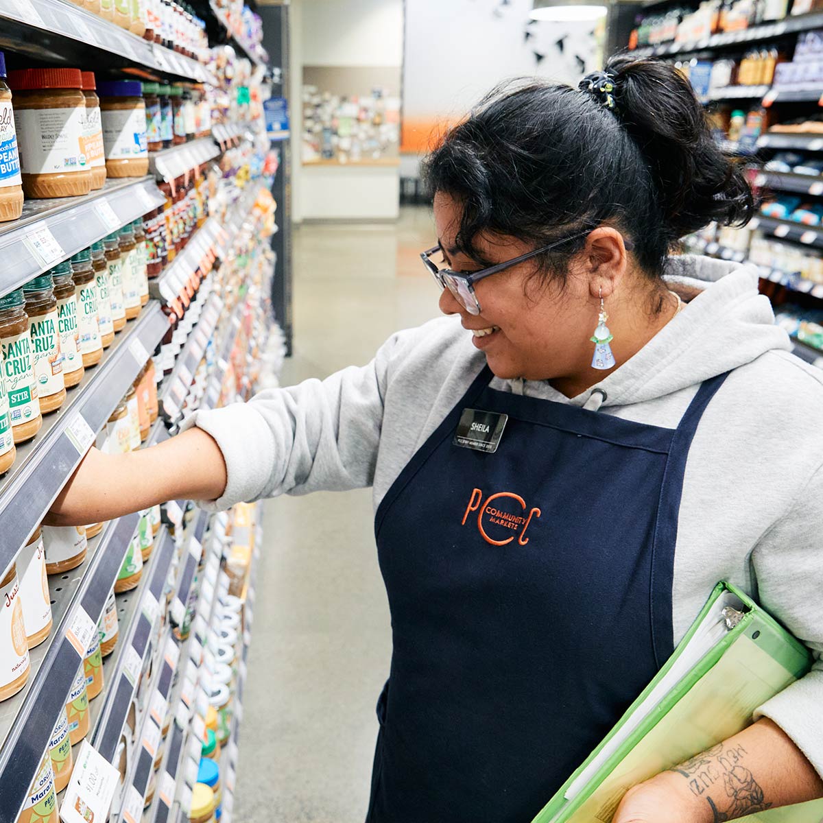 Sheila working in aisle 