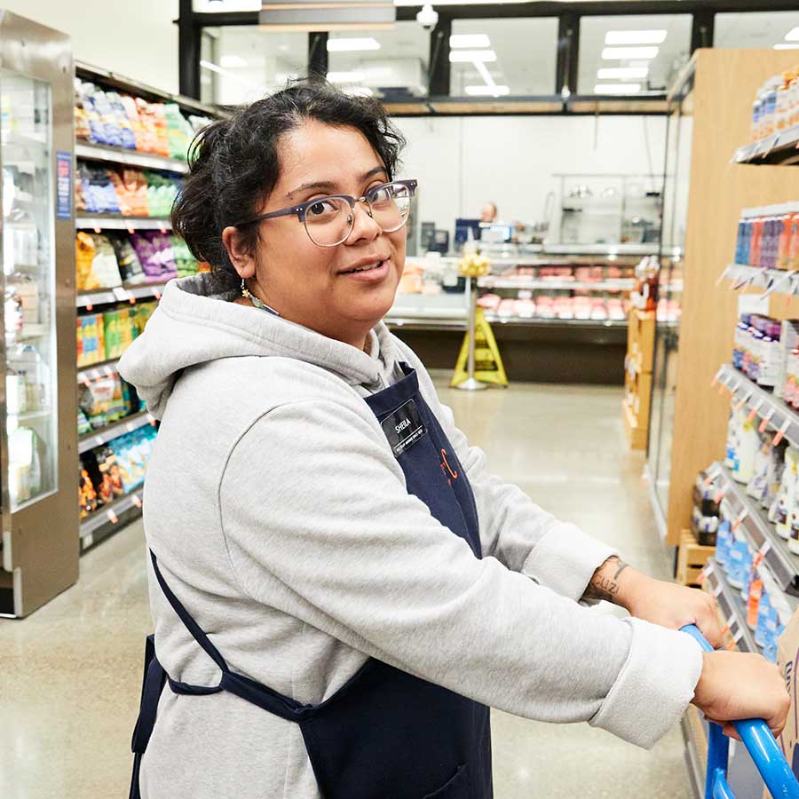 Sheila pushing cart 