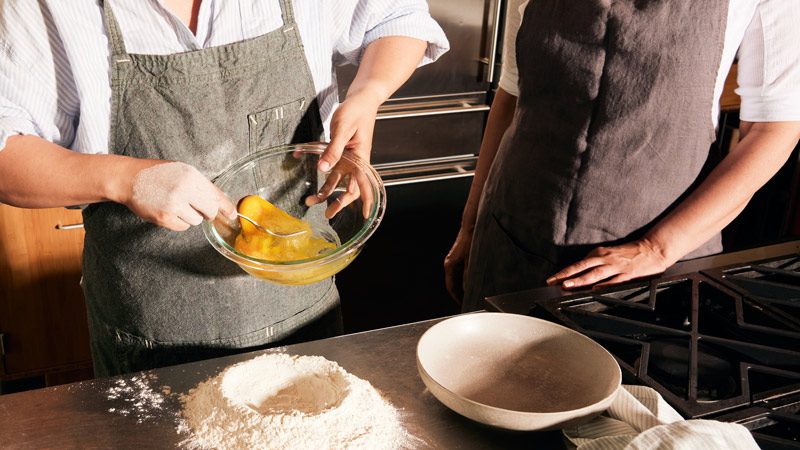 mixing egg for fresh pasta